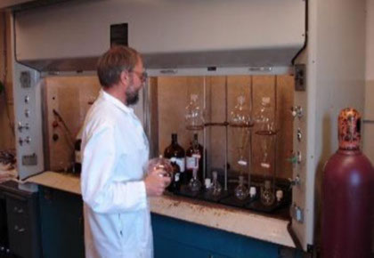 Man in lab coat in lab
